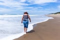 Woman Walking Beach Wave Shoreline Wash