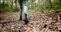 Woman Walking in Boots Lowangle View