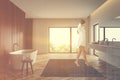 Woman walking in dark wooden bathroom Royalty Free Stock Photo