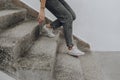 Woman walking down the stairs Royalty Free Stock Photo