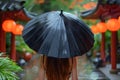 Woman Walking Down Street Holding Umbrella Royalty Free Stock Photo