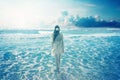 Woman walking on dreamy beach enjoying ocean view Royalty Free Stock Photo