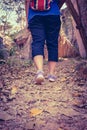 Woman walking exercise in forest, motivational health concept, o