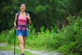 Woman walking on hiking trail