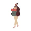 Woman walking, holding gift boxes stack in hands. Female going, carrying Christmas presents. Happy young person after Royalty Free Stock Photo