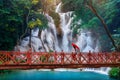 Woman walking at Kuang Si waterfall in Luang Prabang, Laos Royalty Free Stock Photo