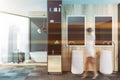Woman walking in luxury wooden bathroom Royalty Free Stock Photo