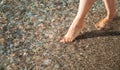 Woman walking near the seashore Royalty Free Stock Photo