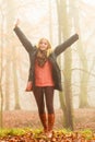 Woman walking in park in foggy day Royalty Free Stock Photo