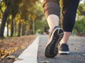 Woman walk in park outdoor workout exercise Healthy lifestyle Royalty Free Stock Photo