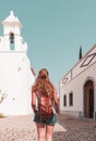 Woman walking in portuguese street- Tavira Royalty Free Stock Photo