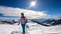 Katschberg - A woman walking on powder snow with her snowboard Royalty Free Stock Photo