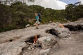 Woman walking on the rocks of the Chimaera mountain Royalty Free Stock Photo