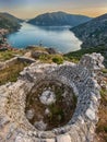 Woman Walking among Ruins of Ancient Fortress Royalty Free Stock Photo