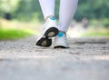 Woman walking in running shoes outdoors Royalty Free Stock Photo