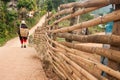 Woman walking rural village