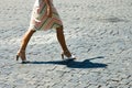 Woman walking with shadow