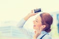 Woman walking on street listening music on mobile smart phone Royalty Free Stock Photo