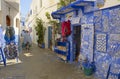 Woman walking on the streets of Asilah