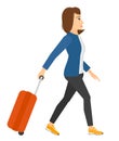 Woman walking with suitcase