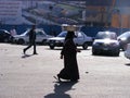 Woman walking in tahrir square Royalty Free Stock Photo