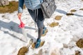 Woman walking thru the thaw making steps Royalty Free Stock Photo
