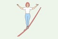 Woman walking tightrope