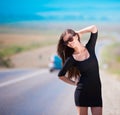 Woman walking to road, half height! Royalty Free Stock Photo