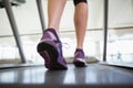 Woman walking on the treadmill Royalty Free Stock Photo