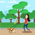 Woman walking with two dog