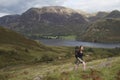 Woman walking up Red Pike in the Lake District Royalty Free Stock Photo