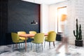 Woman walking in white and black dining room Royalty Free Stock Photo