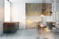 Woman walking in white and wooden kitchen Royalty Free Stock Photo