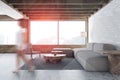 Woman walking in white and wooden living room Royalty Free Stock Photo