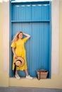 Woman walking in yellow dress at Paphos old city Royalty Free Stock Photo