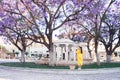 Woman walking in yellow dress at Paphos old city Royalty Free Stock Photo