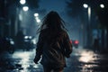 Woman walks away down dark street alone, lonely adult girl at night