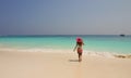 Girl tourists enjoy the sea on the beach. Koh Tao, south of Thailand Royalty Free Stock Photo