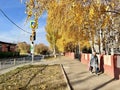Ufa, Republic of Bashkortostan, Russia, October 17, 2021: Woman walks down Mendeleev Street in Ufa in autumn. Republic of Bashkort Royalty Free Stock Photo