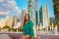 woman walks streets of Dubai, Dubai Marina