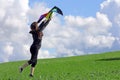 A woman wants to fly a kite in autumn Royalty Free Stock Photo