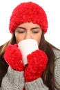 Woman in warm festive woolly hat with hot drink Royalty Free Stock Photo
