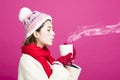 Woman in warm sweater drinking a cup of tea Royalty Free Stock Photo