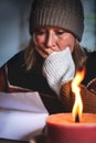 Woman with warm winter clothes is is reading Royalty Free Stock Photo