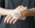 Woman wash hand wet wipes, to prevent illness Novel coronavirus 2019-nCoV after public place