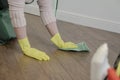 A woman washes the floor with a rag with detergents. house cleaning Royalty Free Stock Photo