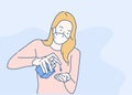 Woman washes her hands with sanitizer alcohol gel. Infection control concept.