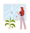 Woman washes window. Female character cleans windows with spray detergent, clean home and housekeep concept. Housework Royalty Free Stock Photo