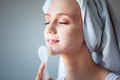 Woman washing cleaning face and skin with brush soap and wather Royalty Free Stock Photo