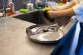 close up hands of Woman Washing Dishes in the kitchen Royalty Free Stock Photo